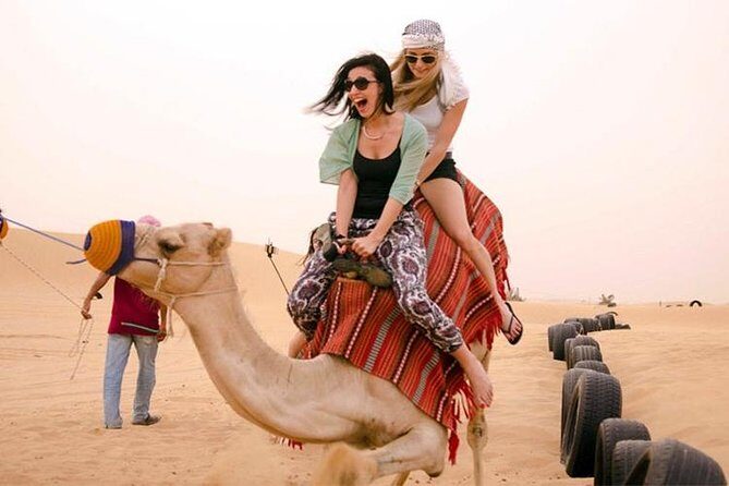 Red Dune Safari with Quad Bike Sand Boarding and Camel Ride - Practical Tips for Booking and Participating