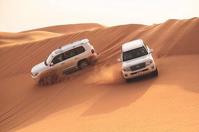 Red Dunes Dubai Desert Safari with Live show, Sandboarding & BBQ - Key Points