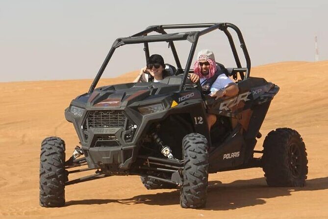 Red Dunes Lahabab Desert Safari With Quad Bike - Unique Encounters: Camels and Traditional Activities