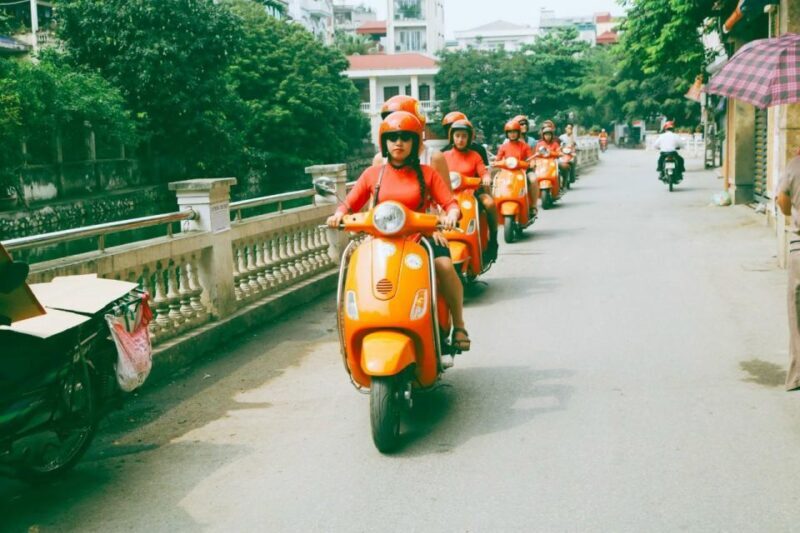 Red River delta & rural village with female Ao dai riders - An Overview of the Experience