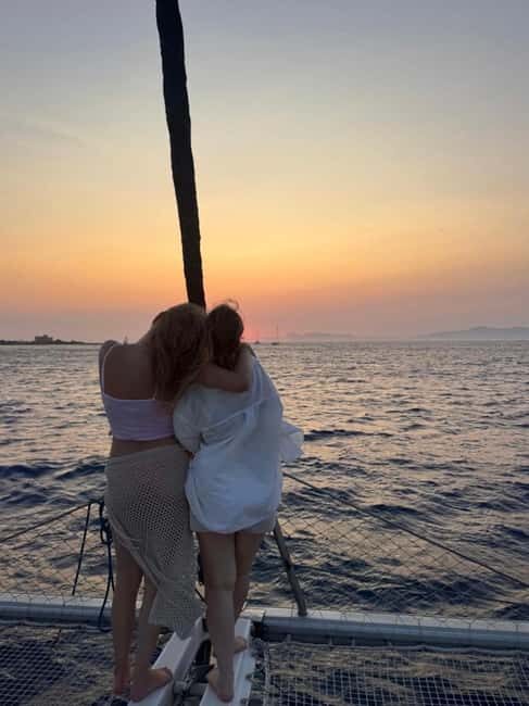 Rhodes: Sunset Catamaran Cruise with Snack, Fruits & Drinks - Price and Value