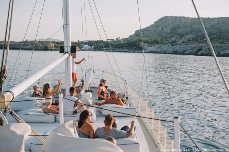Rhodes: Sunset Cruise with Open Bar, Dinner, & Live Music - Authentic Insights from Reviews