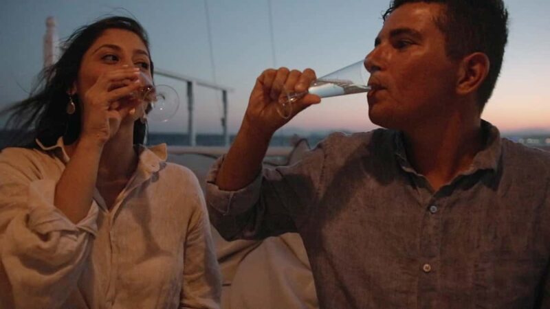 Rhodes: Sunset Cruise with Open Bar, Dinner, & Live Music - The Sum Up