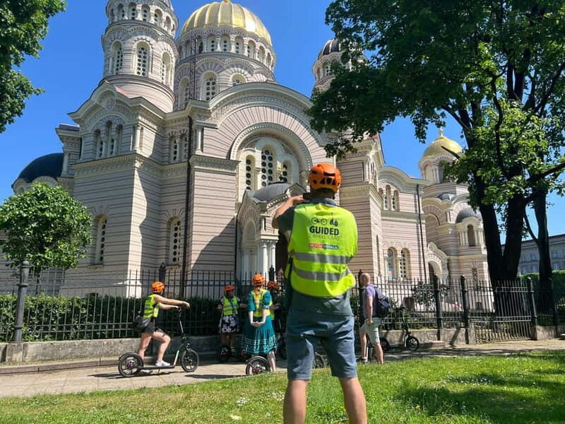 Riga Highlight Big wheel e-scooter Group or Private tour - A Modern Way to Explore Riga