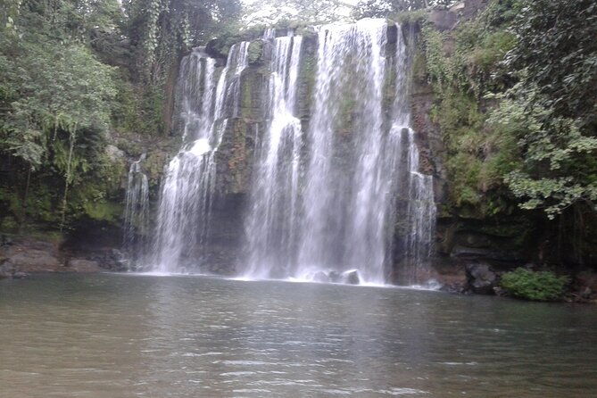 rio-celeste-waterfall-hiking-llanos-del-cortes-waterfall-sloth-observatory