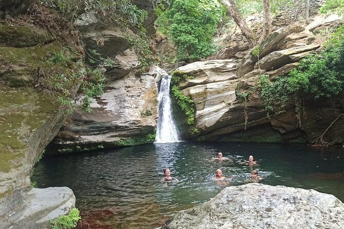 river-trekking-to-the-waterfall-in-andros