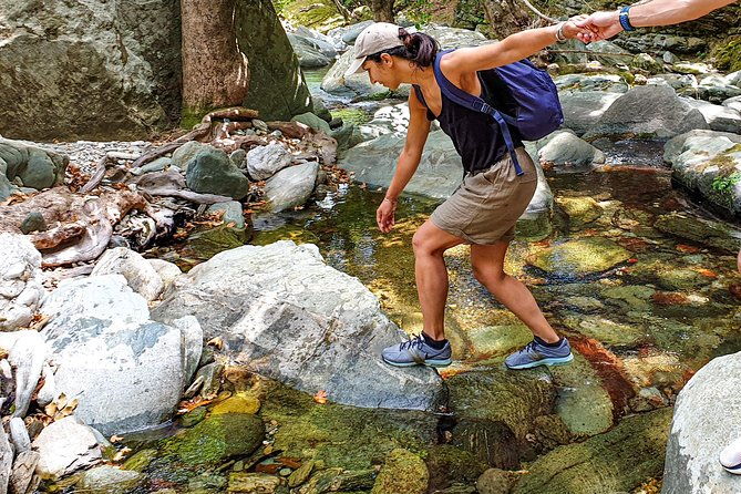 river-trekking-to-the-waterfall-in-andros