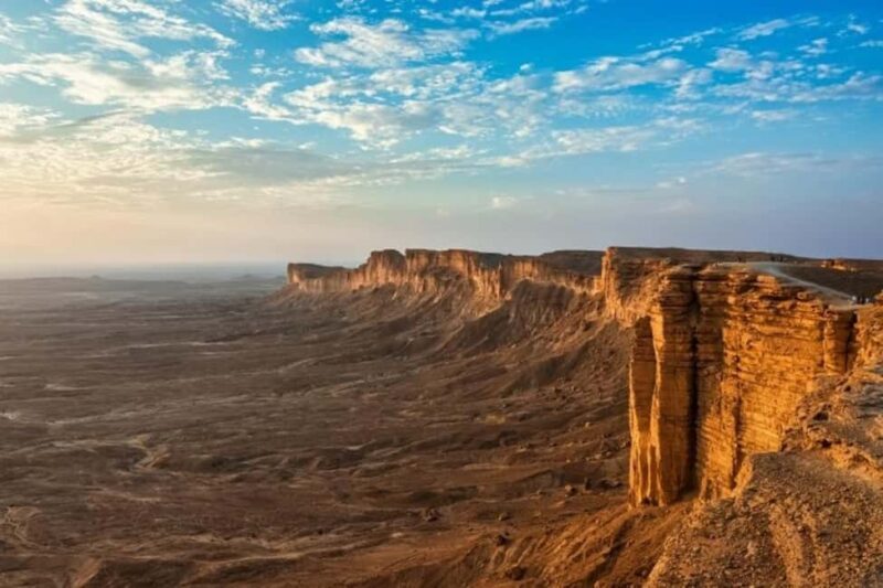 Riyadh: Edge of the World Hiking, Camel Ride, and Cave Tour - Key Points