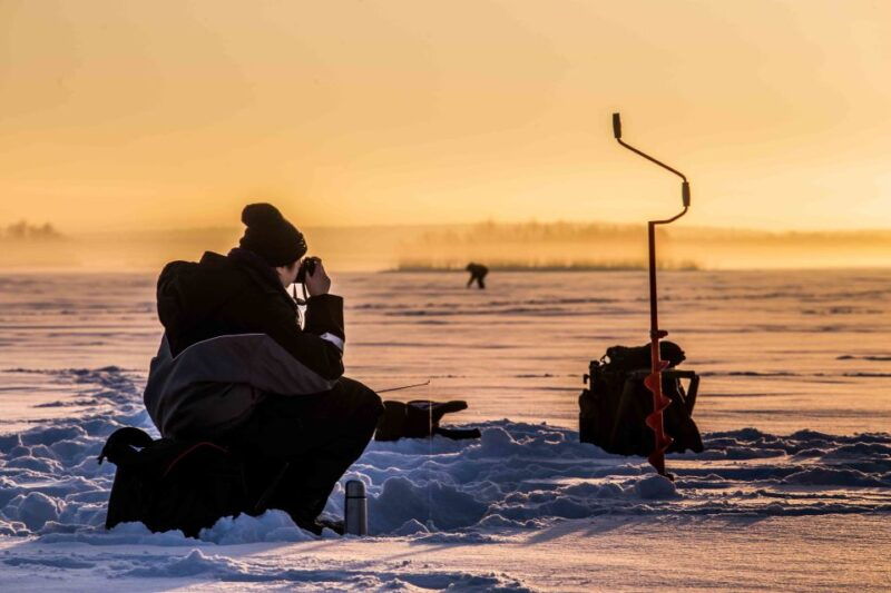 rovaniemi-ice-fishing-on-a-frozen-lake
