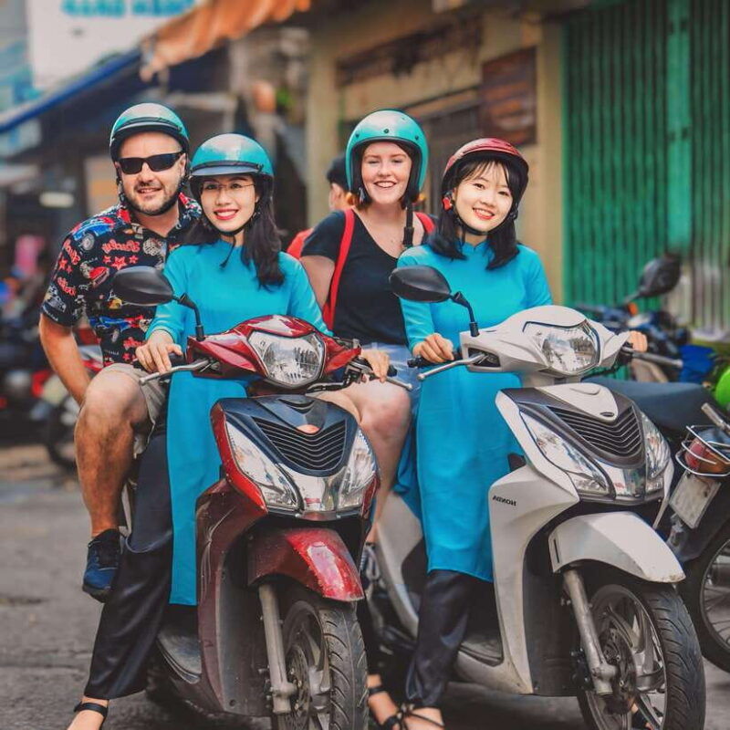 saigon-michelin-guide-food-tour-with-ao-dai-female-riders