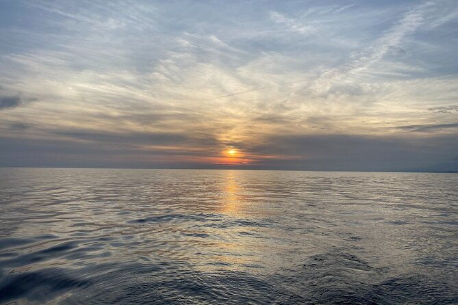 sailing-at-sunset-along-the-cliffs-of-maro-compartida