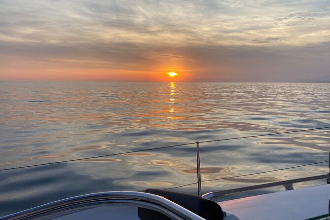 sailing-at-sunset-along-the-cliffs-of-maro-compartida