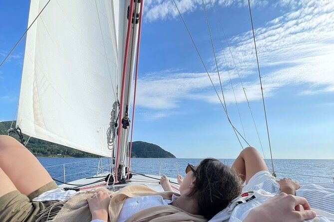 sailing-boat-with-aperitif-at-sunset-in-cilento