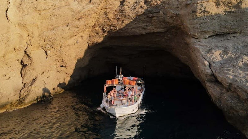 San Antonio: Cala Bassa, Cala Conta and Cave Boat Trip - Food, Drinks, and Atmosphere