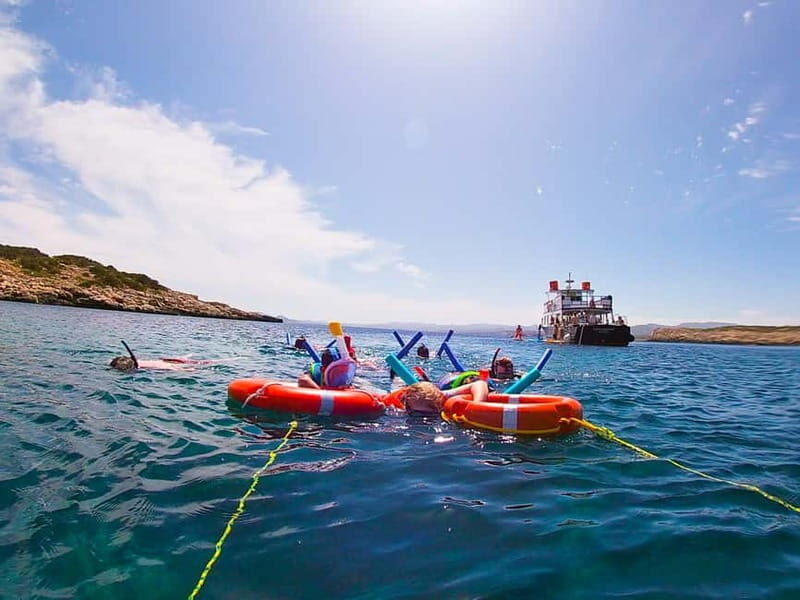 San Antonio: Family Boat Trip to Conillera island - The Sum Up
