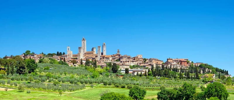 San Gimignano: The Medieval City - Piazza del Duomo and Piazza della Cisterna