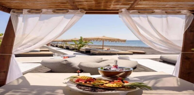 Santorini: Candlelight Restaurant Dinner on Black Sand Beach - Who Should Consider This Experience?