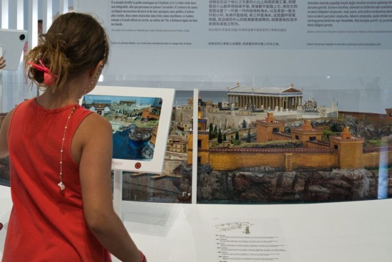 Santorini: Mythical Day Trip to Akrotiri with Volcano Cruise - The Volcano Adventure: From Land to Sea