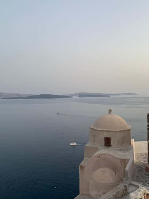 Santorini: Oia Sunrise Walking Tour with Local Guide - The Sum Up
