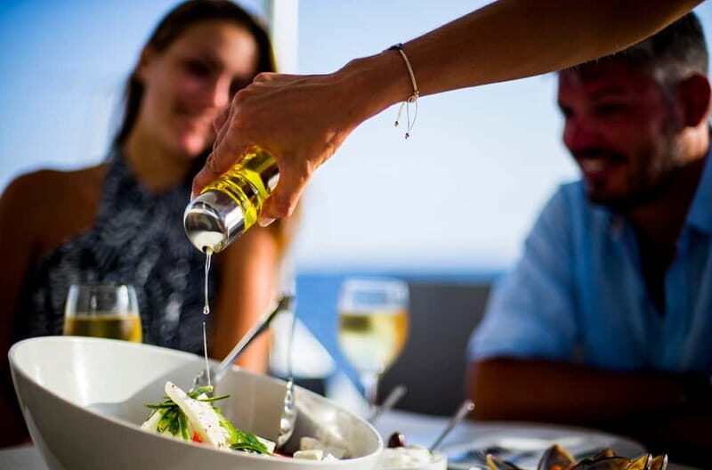 Santorini: Private Catamaran Cruise with BBQ Meal and Drinks - Discovering Hidden Caves and Coasts
