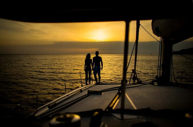 Santorini: Private Catamaran Cruise with BBQ Meal and Drinks - Final Return and Memories