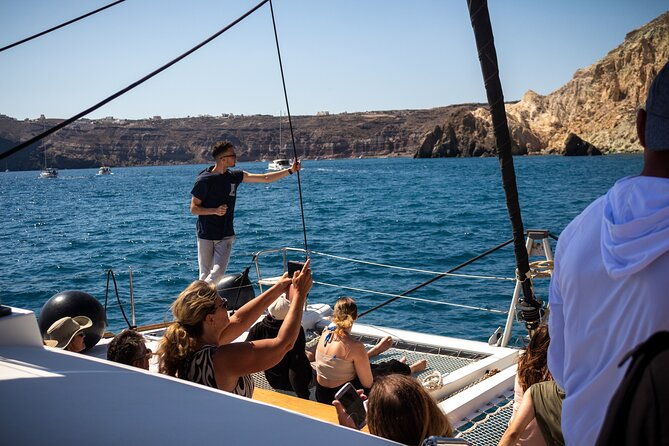 santorini-sailing-sunset-catamaran-cruise-w-greek-bbq-thirasia