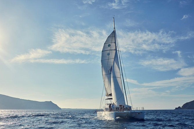 santorini-sunset-luxury-sailing-catamaran-cruise-with-bbq-drinks-transfer