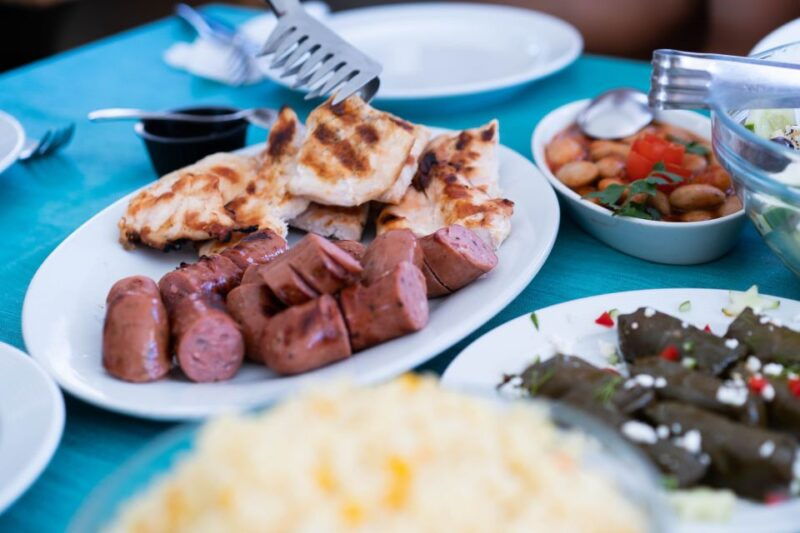 santorini-traditional-wooden-boat-tour-with-meal-and-wine