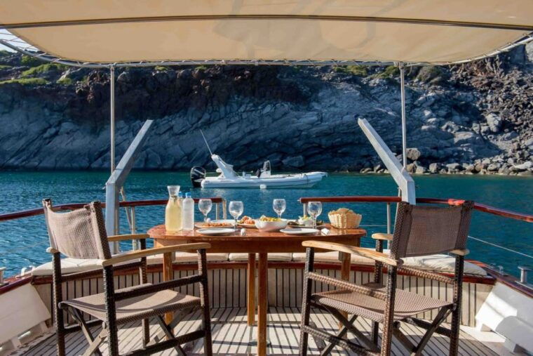 santorini-traditional-wooden-boat-tour-with-meal-and-wine