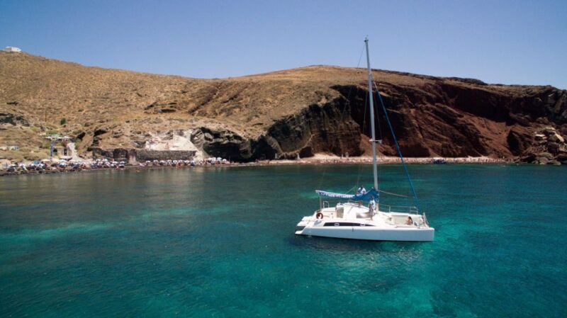 Santorini:Catamaran: private cruise with food & drinks - Exploring the Santorini Catamaran Experience