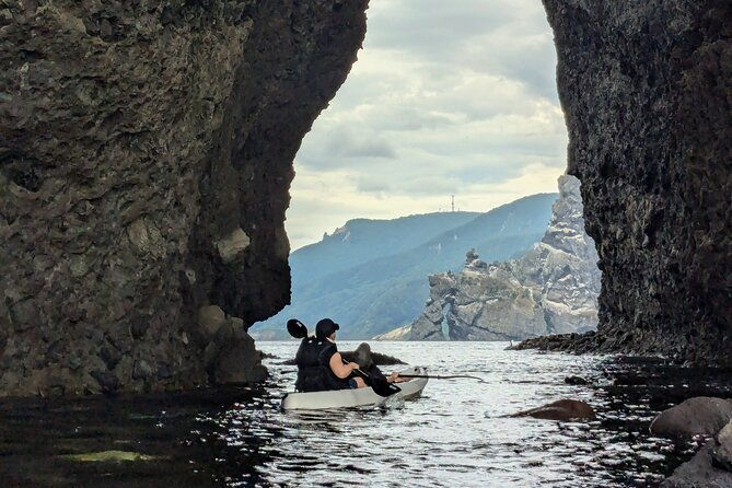 sea-kayaking-on-the-pristine-hokkaido-coastline-to-blue-cave