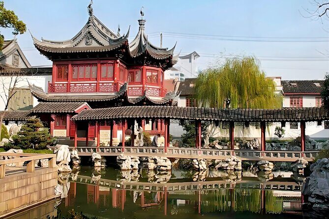 Seat in Coach Shanghai Highlight Half Day City Tour - Exploring the Itinerary in Detail