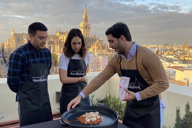 Sevilla: Panoramic Highlights Rooftop Tour & Paella Cooking Class - The Cooking Experience
