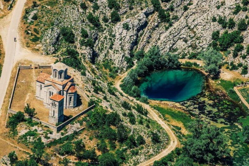 sinj-panoramic-flight-over-peruca-lake-and-dinara-mountain