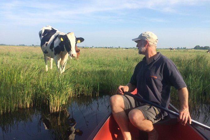 Small-Group Guided Sunset Canoe Tour in Waterland with Dinner - Key Points