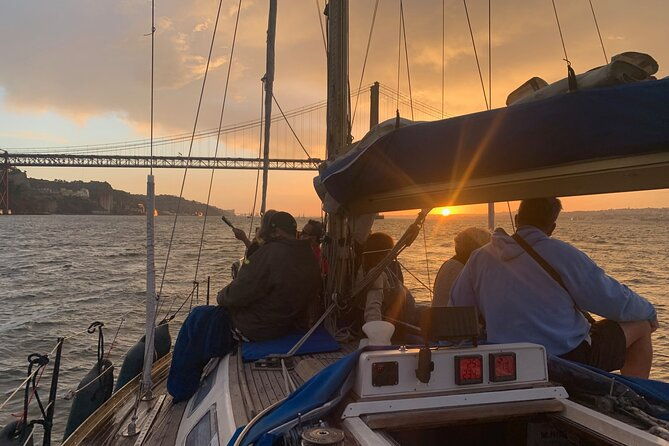 small-group-sailboat-sunset-tour-in-lisbon-with-a-drink