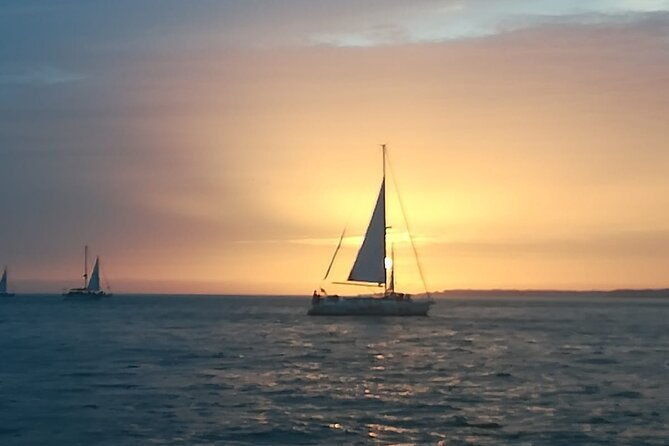 small-group-sailboat-sunset-tour-in-lisbon-with-a-drink
