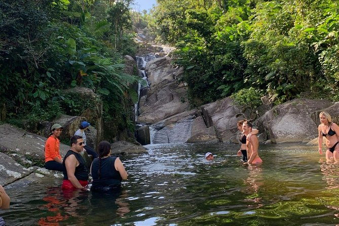 small-groups-el-yunque-waterslide-shopping-and-plus-beach
