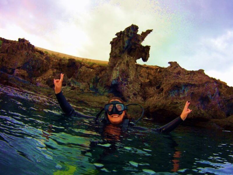 snorkeling-in-a-volcanic-bay
