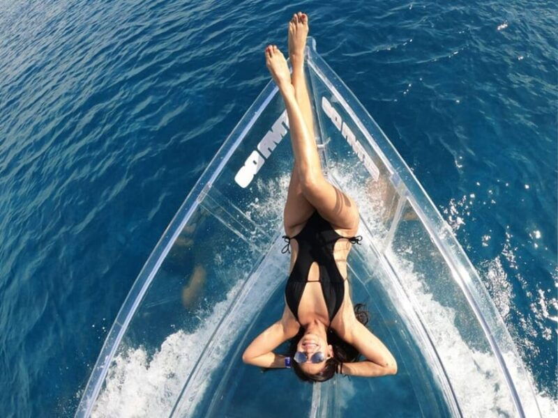 snorkeling-in-cozumel-waters-in-a-transparent-boat-beers