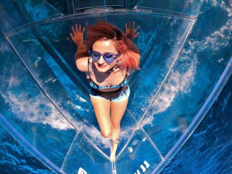 snorkeling-in-cozumel-waters-in-a-transparent-boat-beers