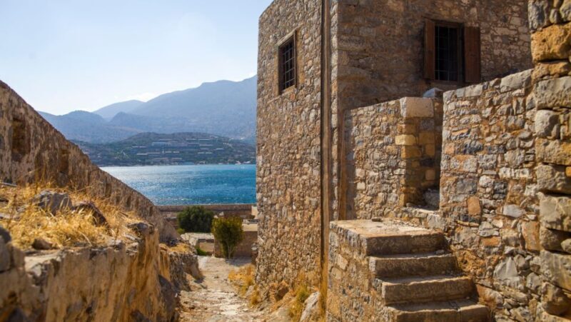 Spinalonga with Guide, Kolokitha Bay Cruise, Swimming & BBQ - Spinalonga Island: A Fortress of Stories