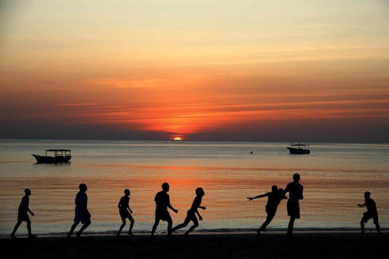 Stone Town: Sunset Dhow Cruise with Drinks, Snacks & Music - Key Points