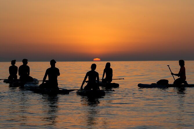 sunrise-paddle-surf-with-instructor-and-photos-included