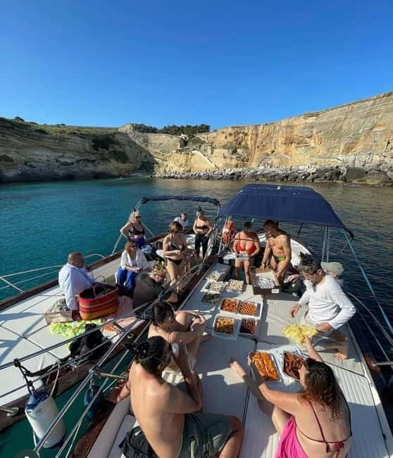 Sunset Aperitif on a Boat  Castro - The Sum Up