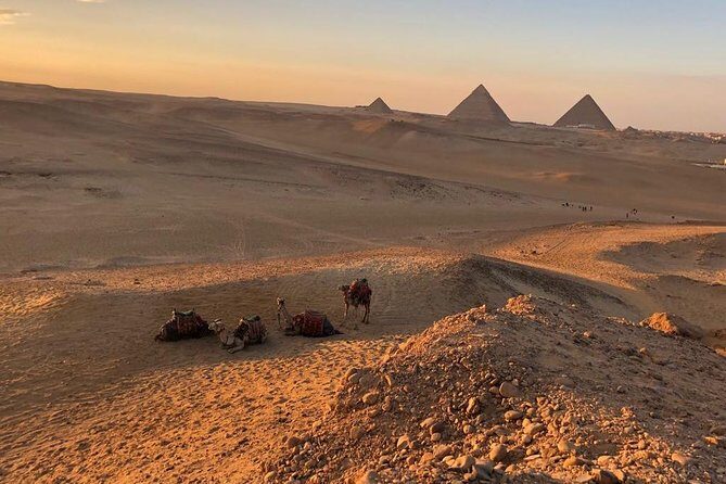 sunset at Giza pyramids by camels - An Authentic Cairo Experience with a View