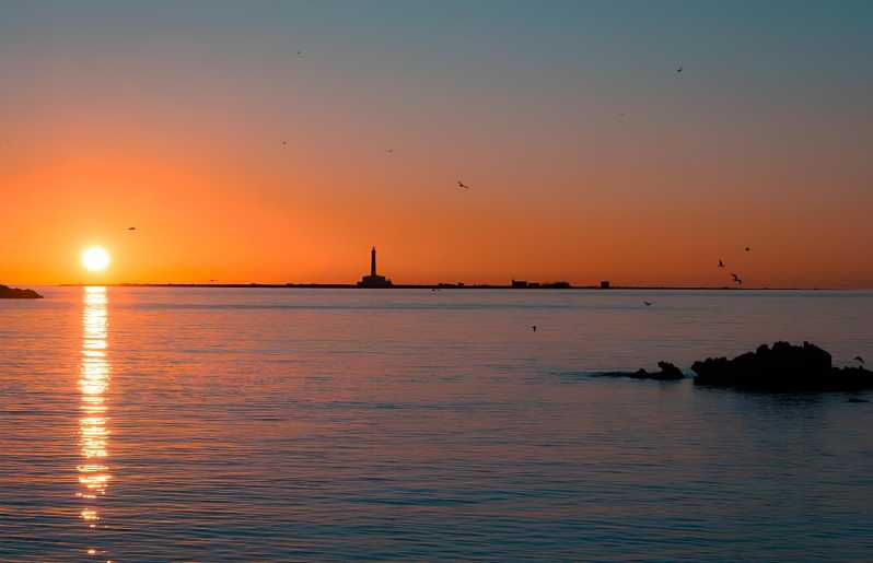 sunset-at-the-island-of-s-andrea-gallipoli-with-aperitif