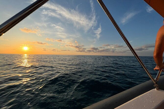 sunset-boat-tour-along-the-coast-of-the-gods