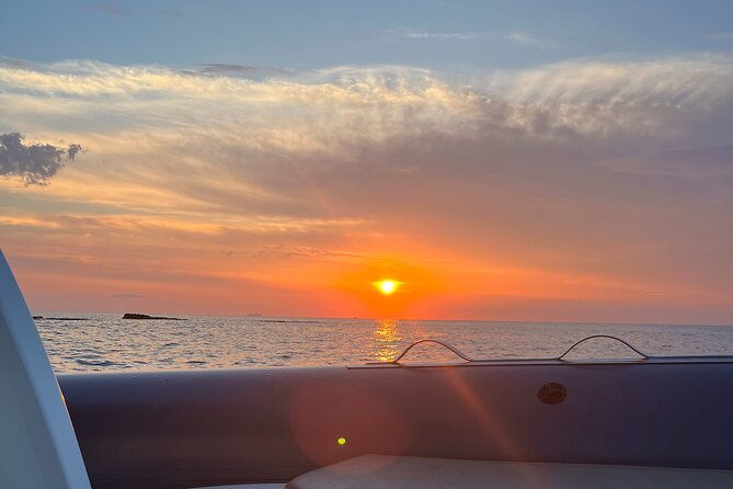 sunset-boat-tour-along-the-coast-of-the-gods