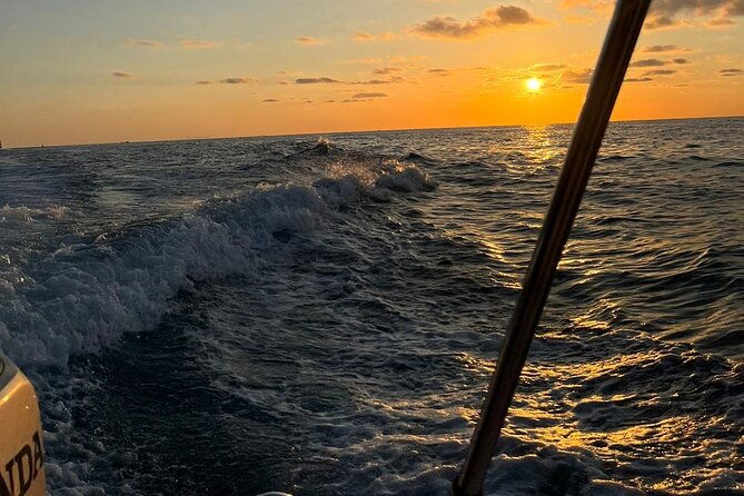 sunset-boat-tour-along-the-coast-of-the-gods